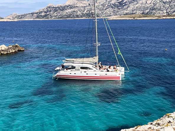 Visit of the Calanques National Park by catamaran, stopover at the island of Riou
