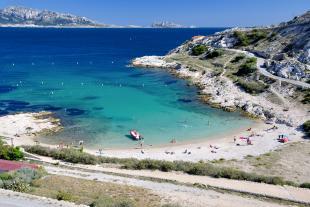 Sand beach and view of the massif de Marseilleveyre