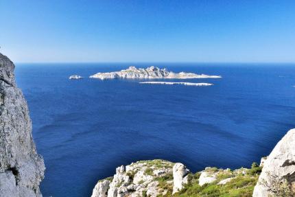 In the background, Riou Island